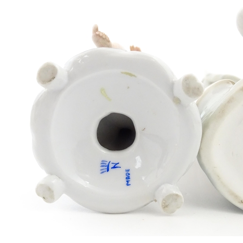 138 - A Lladro figure Girl with Geese, and a Lladro model of a goose. Together with a Capodimonte model of... 