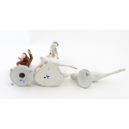 138 - A Lladro figure Girl with Geese, and a Lladro model of a goose. Together with a Capodimonte model of... 