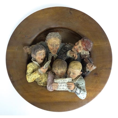 162 - A large Austrian terracotta relief plaque depicting a choir and musicians, with circular wooden moun... 
