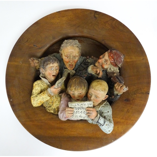 162 - A large Austrian terracotta relief plaque depicting a choir and musicians, with circular wooden moun... 