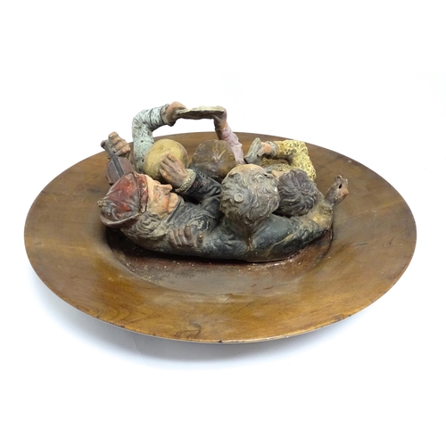 162 - A large Austrian terracotta relief plaque depicting a choir and musicians, with circular wooden moun... 