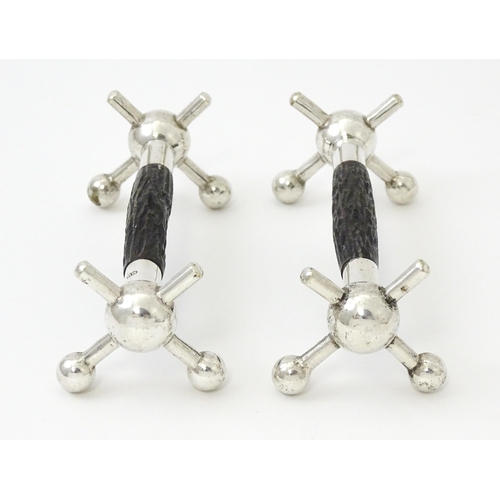 434 - A pair of silver knife rests with antler detail, hallmarked Sheffield 1913, maker John Biggin. Appro... 