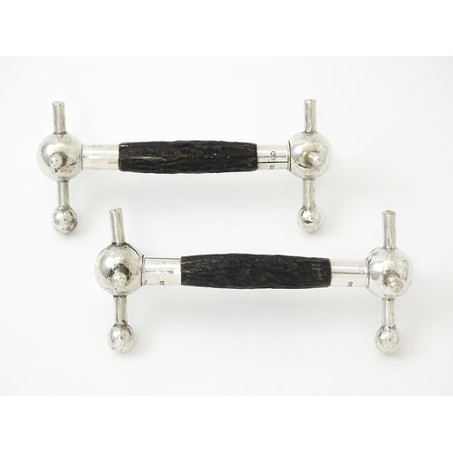 434 - A pair of silver knife rests with antler detail, hallmarked Sheffield 1913, maker John Biggin. Appro... 