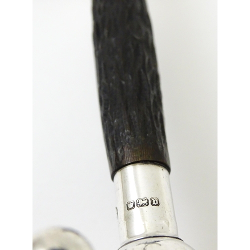 434 - A pair of silver knife rests with antler detail, hallmarked Sheffield 1913, maker John Biggin. Appro... 