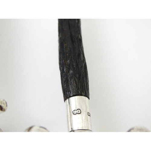 434 - A pair of silver knife rests with antler detail, hallmarked Sheffield 1913, maker John Biggin. Appro... 