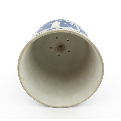 126 - A Wedgwood style jasperware cheese dish and cover / dome decorated with Classical figures / muses, a... 