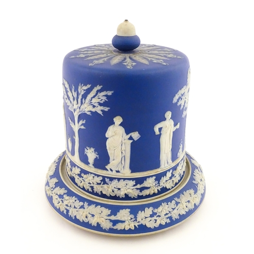 126 - A Wedgwood style jasperware cheese dish and cover / dome decorated with Classical figures / muses, a... 