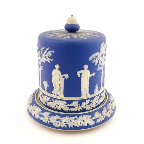 126 - A Wedgwood style jasperware cheese dish and cover / dome decorated with Classical figures / muses, a... 