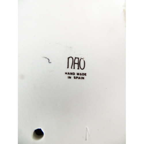 137 - Two Nao figure groups comprising Courting Couple, and two young girls with a bird on a bench. Larges... 