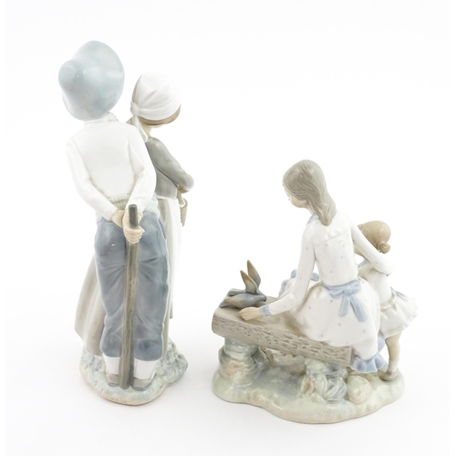 137 - Two Nao figure groups comprising Courting Couple, and two young girls with a bird on a bench. Larges... 