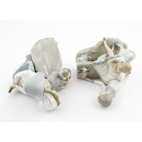 137 - Two Nao figure groups comprising Courting Couple, and two young girls with a bird on a bench. Larges... 