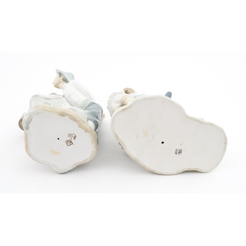 137 - Two Nao figure groups comprising Courting Couple, and two young girls with a bird on a bench. Larges... 