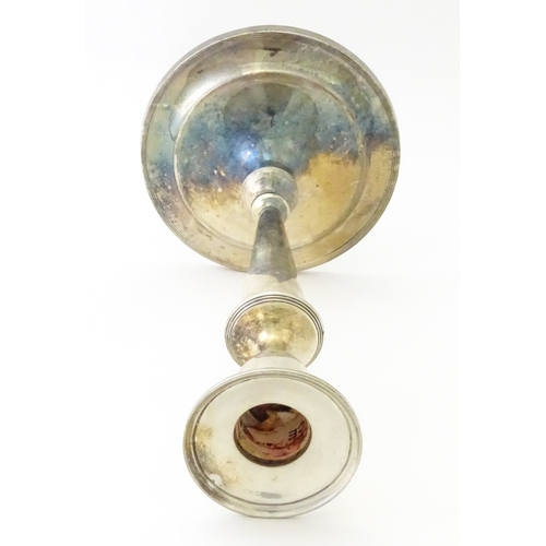 480 - A silver candlestick hallmarked Sheffield 1904, maker Thomas A Scott. Approx. 9 1/4