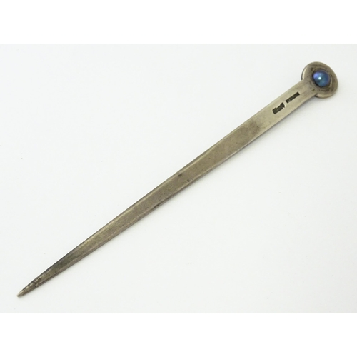280 - A sterling silver letter opener set with blue pearl detail. Approx. 5 1/4