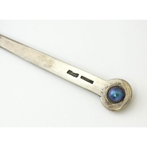 280 - A sterling silver letter opener set with blue pearl detail. Approx. 5 1/4