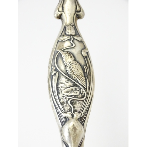 420 - A silver plate vesta case with white metal watch chain. Together with an Art Nouveau silver handle w... 