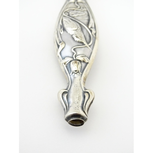 420 - A silver plate vesta case with white metal watch chain. Together with an Art Nouveau silver handle w... 