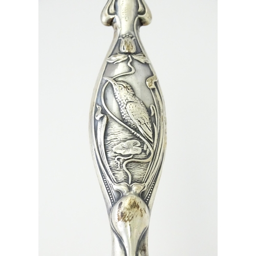 420 - A silver plate vesta case with white metal watch chain. Together with an Art Nouveau silver handle w... 