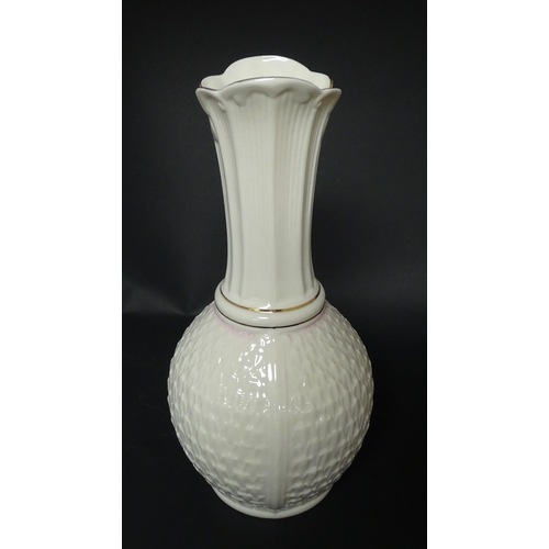 81 - A Belleek Paros vase with flared rim. Marked under. Approx. 10 3/4
