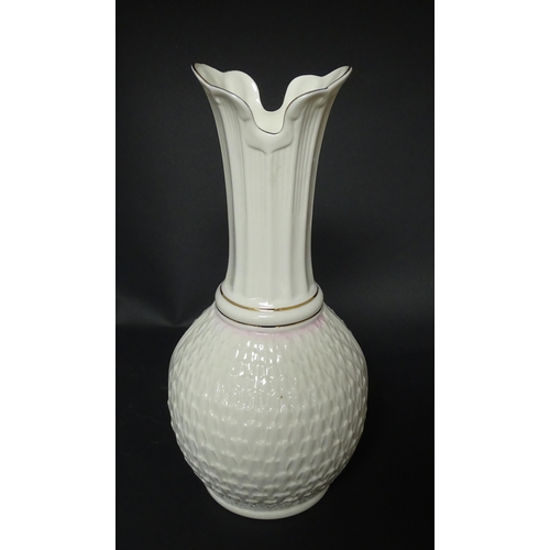 81 - A Belleek Paros vase with flared rim. Marked under. Approx. 10 3/4