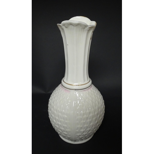 81 - A Belleek Paros vase with flared rim. Marked under. Approx. 10 3/4