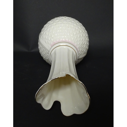 81 - A Belleek Paros vase with flared rim. Marked under. Approx. 10 3/4