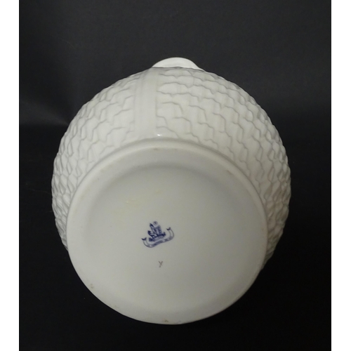 81 - A Belleek Paros vase with flared rim. Marked under. Approx. 10 3/4