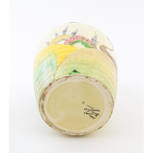 85 - A Clarice Cliff lotus jug / vase with single handle decorated in the Aurea pattern. Marked under 'Ha... 