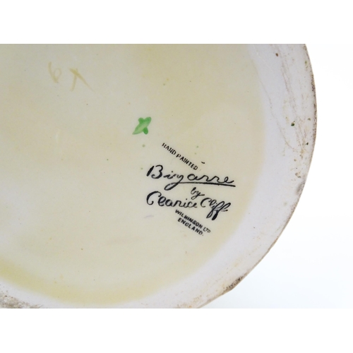 85 - A Clarice Cliff lotus jug / vase with single handle decorated in the Aurea pattern. Marked under 'Ha... 