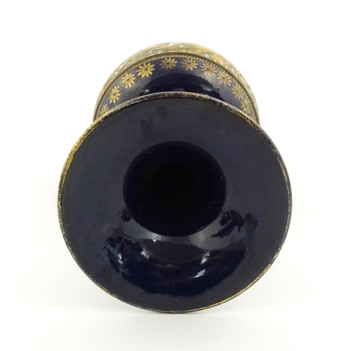 106 - A Royal Doulton vase with flared rim decorated with banded floral and foliate decoration. Marked und... 