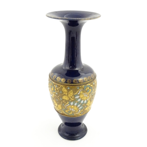 106 - A Royal Doulton vase with flared rim decorated with banded floral and foliate decoration. Marked und... 