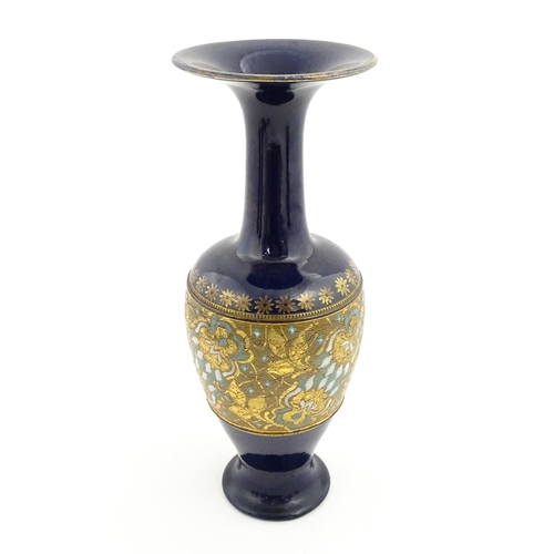 106 - A Royal Doulton vase with flared rim decorated with banded floral and foliate decoration. Marked und... 