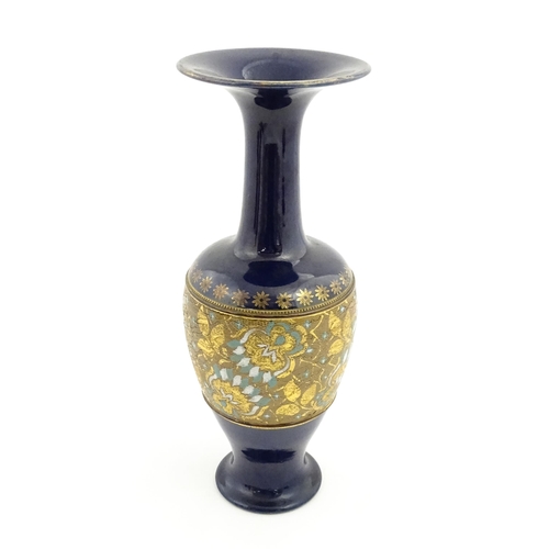 106 - A Royal Doulton vase with flared rim decorated with banded floral and foliate decoration. Marked und... 