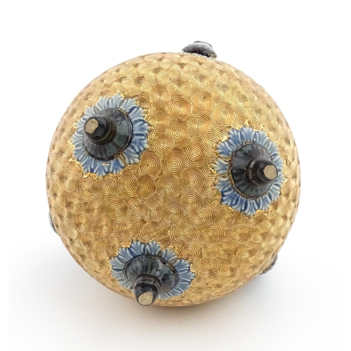 109 - A Royal Doulton stoneware gilt circle tyg of cauldron form with three mottled blue handles, banded d... 