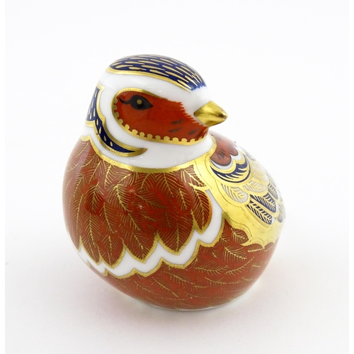 114 - A Royal Crown Derby paperweight modelled as a Chaffinch. Boxed. Approx. 2 1/2