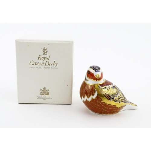 114 - A Royal Crown Derby paperweight modelled as a Chaffinch. Boxed. Approx. 2 1/2