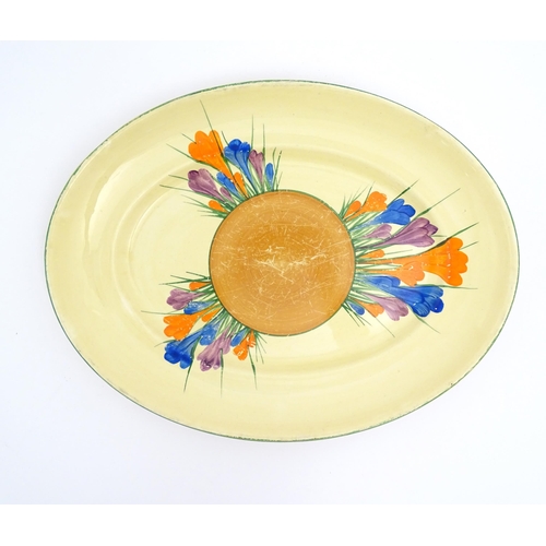 183 - Two Clarice Cliff oval serving plates decorated in the Crocus pattern. Marked under. Largest approx.... 