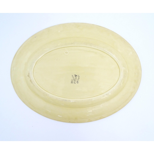 183 - Two Clarice Cliff oval serving plates decorated in the Crocus pattern. Marked under. Largest approx.... 