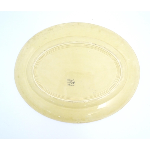 183 - Two Clarice Cliff oval serving plates decorated in the Crocus pattern. Marked under. Largest approx.... 