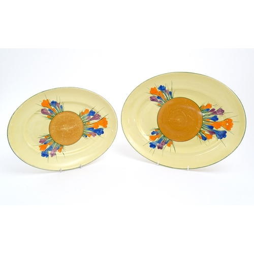 183 - Two Clarice Cliff oval serving plates decorated in the Crocus pattern. Marked under. Largest approx.... 