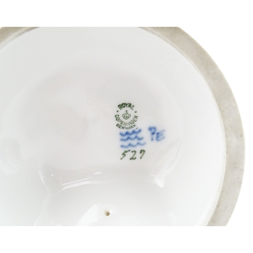 61 - A Royal Copenhagen model Girl with Goose, model no. 527. Marked under. Approx. 9