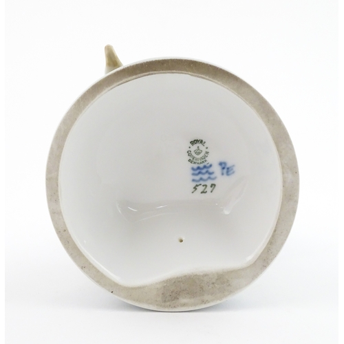 61 - A Royal Copenhagen model Girl with Goose, model no. 527. Marked under. Approx. 9