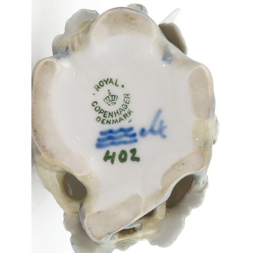 63 - Two Royal Copenhagen models comprising Girl with Doll no. 3539, and Lovebirds no. 402. Marked under.... 