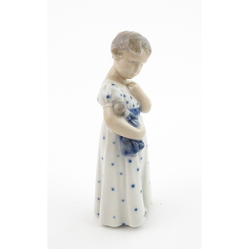 63 - Two Royal Copenhagen models comprising Girl with Doll no. 3539, and Lovebirds no. 402. Marked under.... 