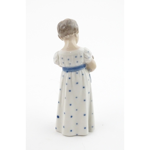 63 - Two Royal Copenhagen models comprising Girl with Doll no. 3539, and Lovebirds no. 402. Marked under.... 