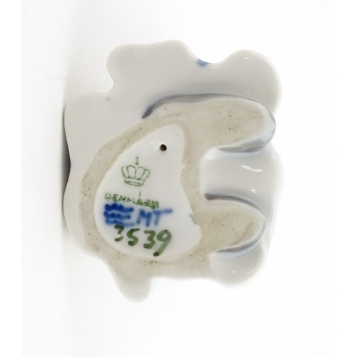 63 - Two Royal Copenhagen models comprising Girl with Doll no. 3539, and Lovebirds no. 402. Marked under.... 