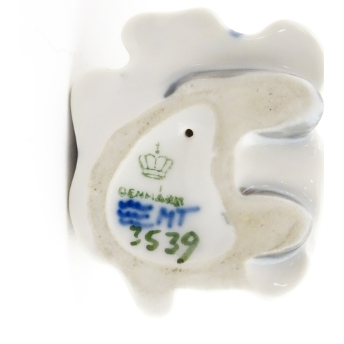 63 - Two Royal Copenhagen models comprising Girl with Doll no. 3539, and Lovebirds no. 402. Marked under.... 