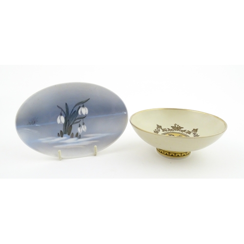 64 - A Royal Copenhagen dish with snowdrop detail, model no. 2685 / 852. Together with a small Kobenhavn ... 