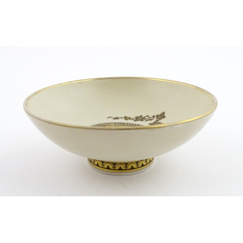 64 - A Royal Copenhagen dish with snowdrop detail, model no. 2685 / 852. Together with a small Kobenhavn ... 