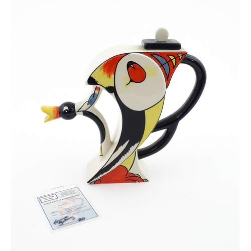 86 - A Lorna Bailey limited edition Puffin teapot. Marked and signed under, and numbered 20 / 50. With ce... 